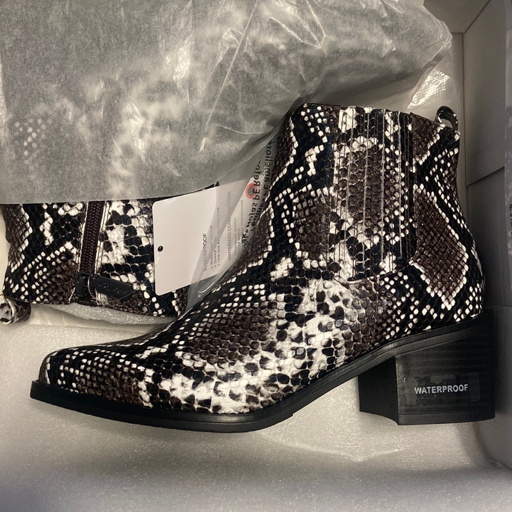 Never worn waterproof snake skin boots